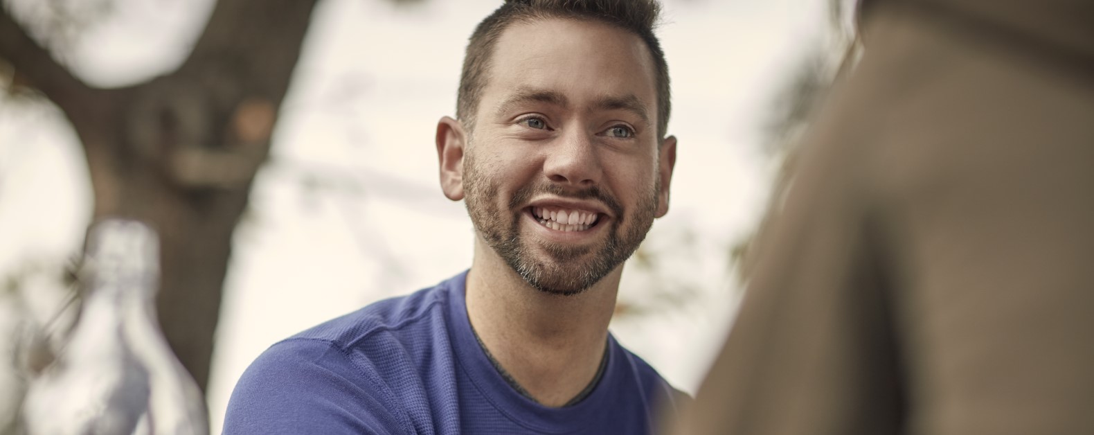 Plasma recipient Nick sitting in a cafe