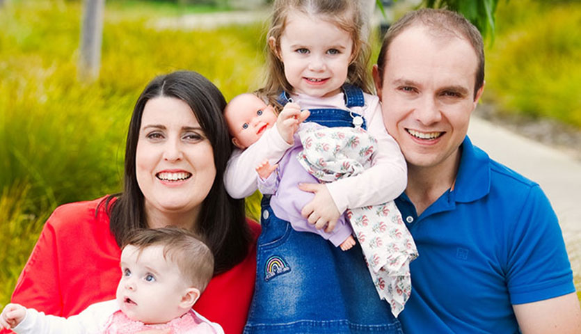 photo of the Hunter family smiling