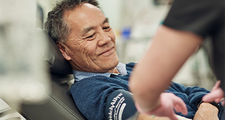 a man in a donor chair about to make a donation