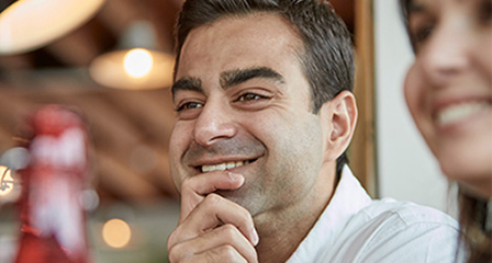 a man and a woman in a cafe