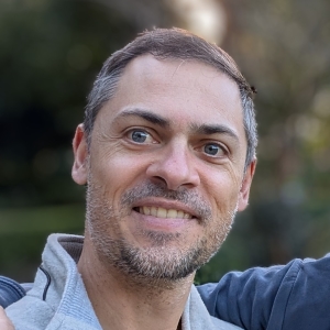 Liam smiling at the camera