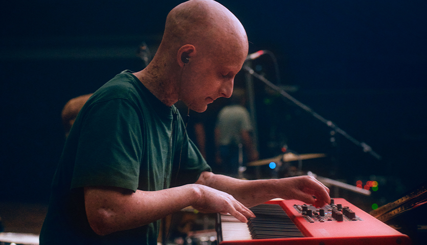 Man playing keyboard