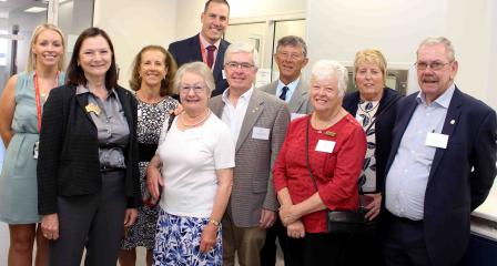 group photo of Rotarians in microbiome laboratory