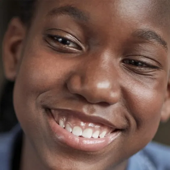 photo of mapalo smiling and looking off camera