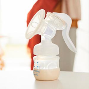 Breast milk pump with milk