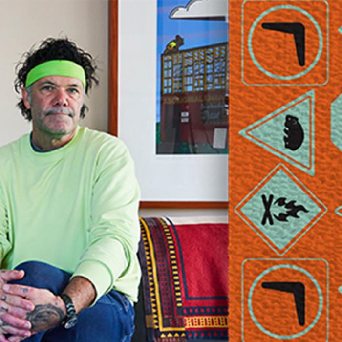 photo of artist blak douglas wearing a green handband and green jumper, on the right hand side is the bandage pattern he designed
