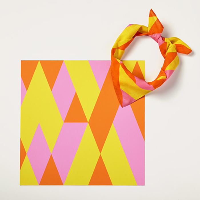 photo of Geoff Nees bandage design and bandana, it's a pattern with orange, yellow and pink geometric shapes